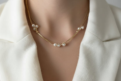 Multi-row pearl necklace made of 925 sterling silver, 18K gold plated