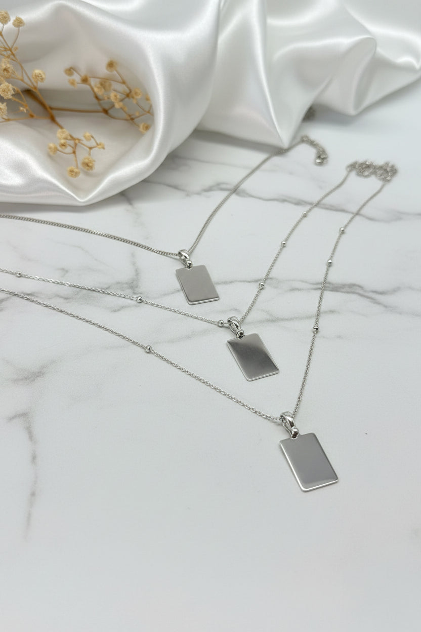 Engraved necklace rectangular pendant 15.90x10.80 mm name date rhodium-plated