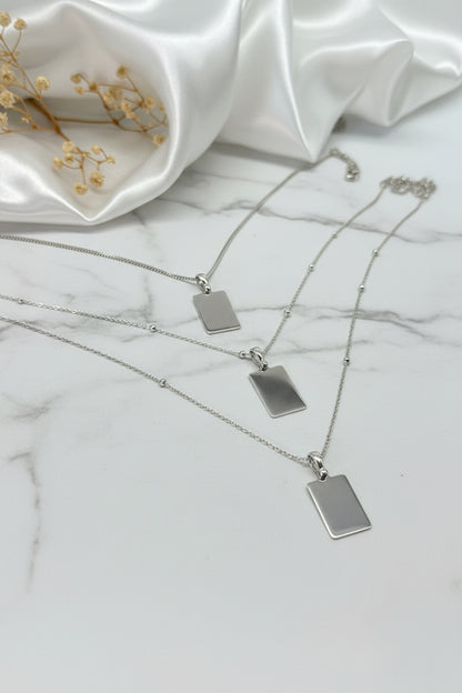 Engraved necklace rectangular pendant 15.90x10.80 mm name date rhodium-plated